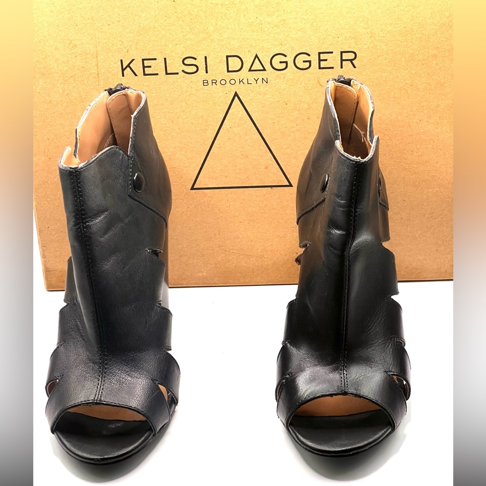 Black sexy leather peep toe booties by Kelsi Dagger